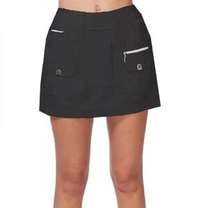JAMIE SADOK - Black GOLF Skort with silver zippered pockets and 2 flap pockets.